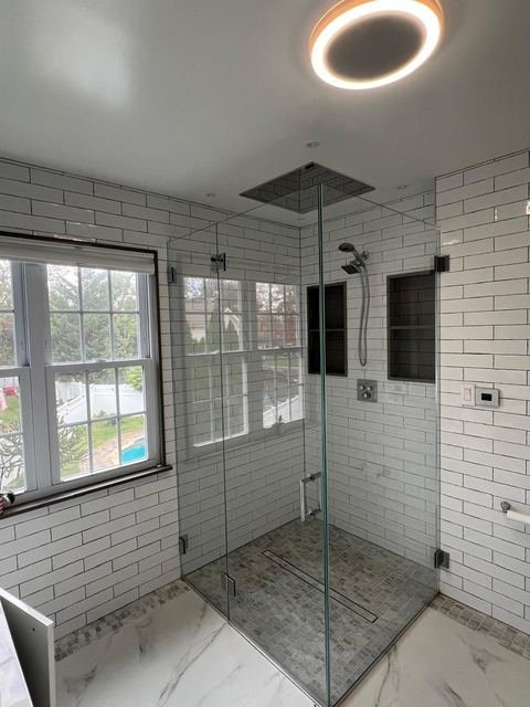 Walk-in shower — rain head & tiled niches