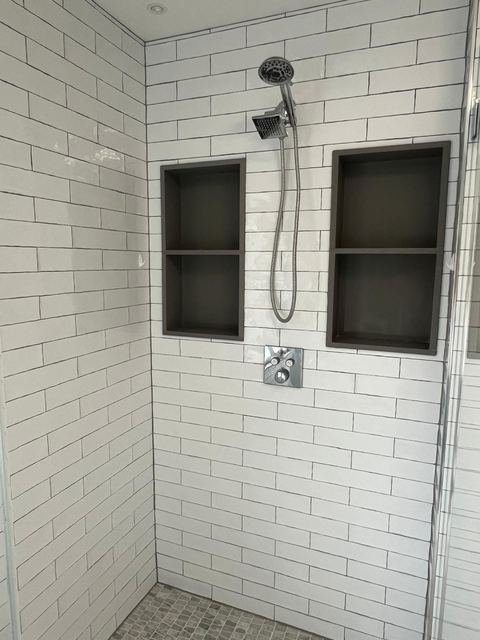Tiled shower niches & hand shower