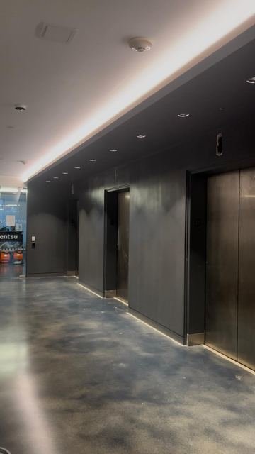 Office corridor — polished concrete & wood slats